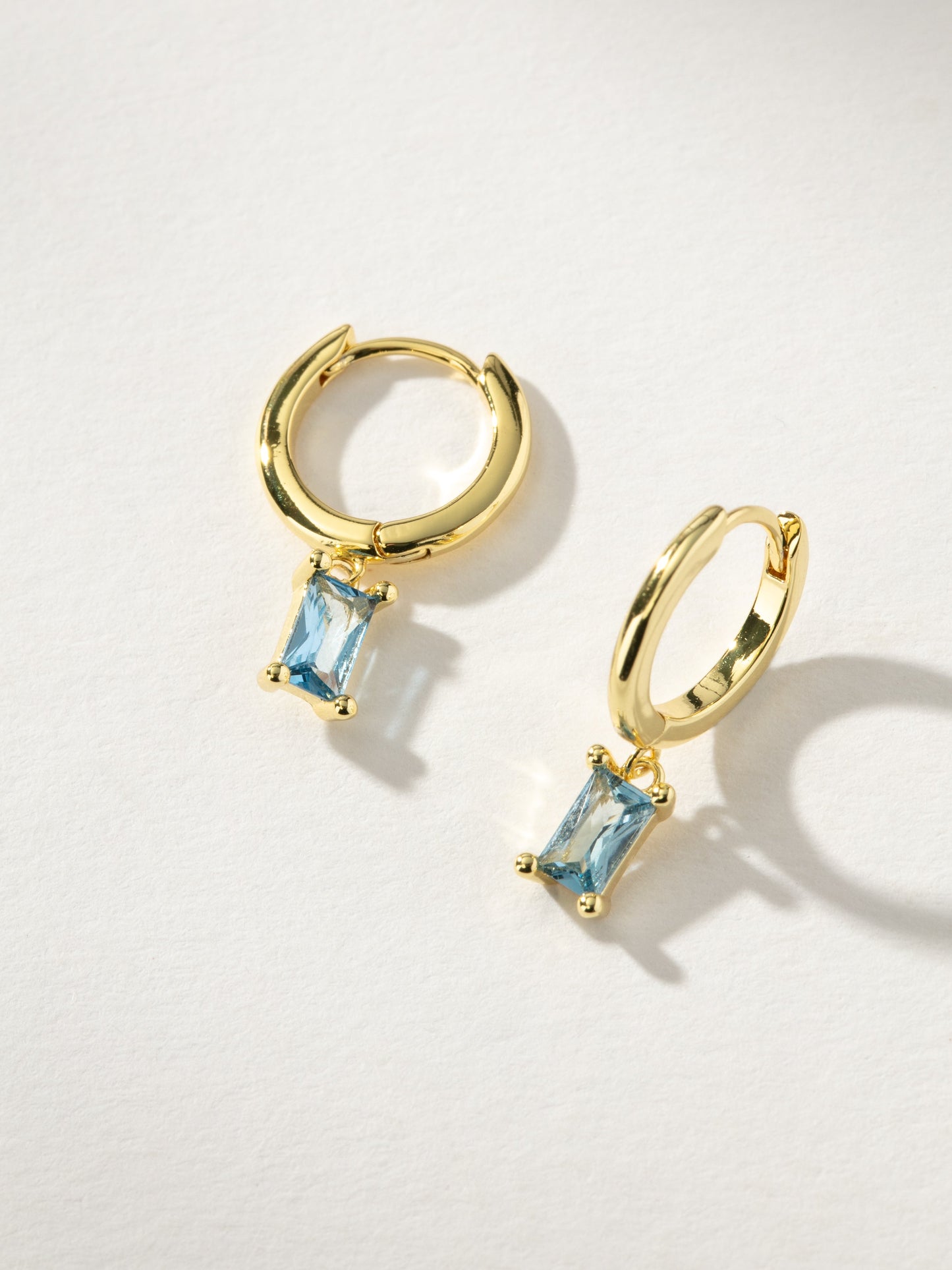 Birthstone Huggie Earrings| Gold December | Product Image | Uncommon James