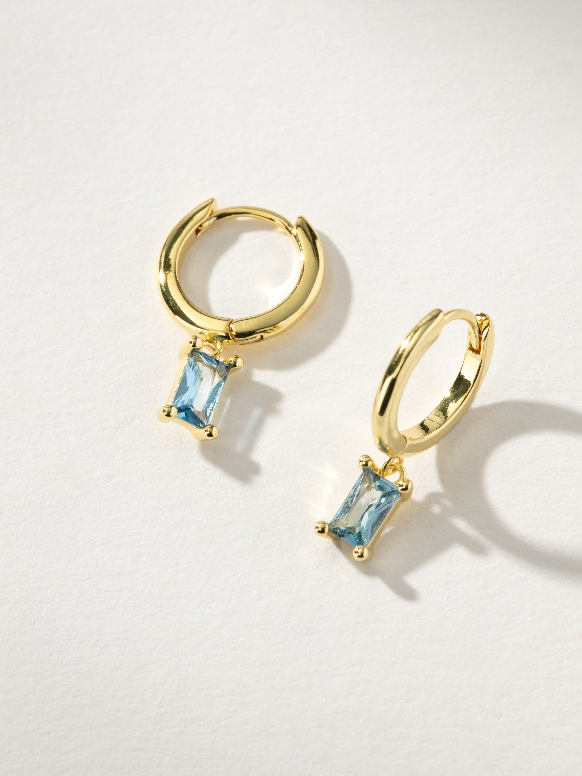 Birthstone Huggie Earrings| Gold December | Product Image | Uncommon James