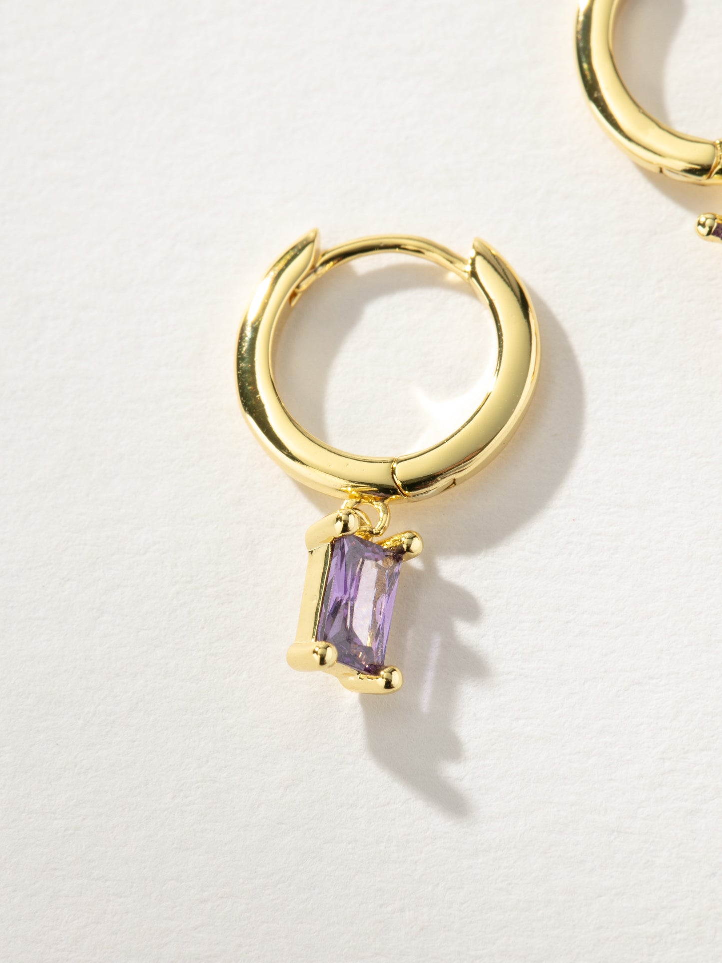 Birthstone Huggie Earrings | Gold February | Product Detail Image | Uncommon James