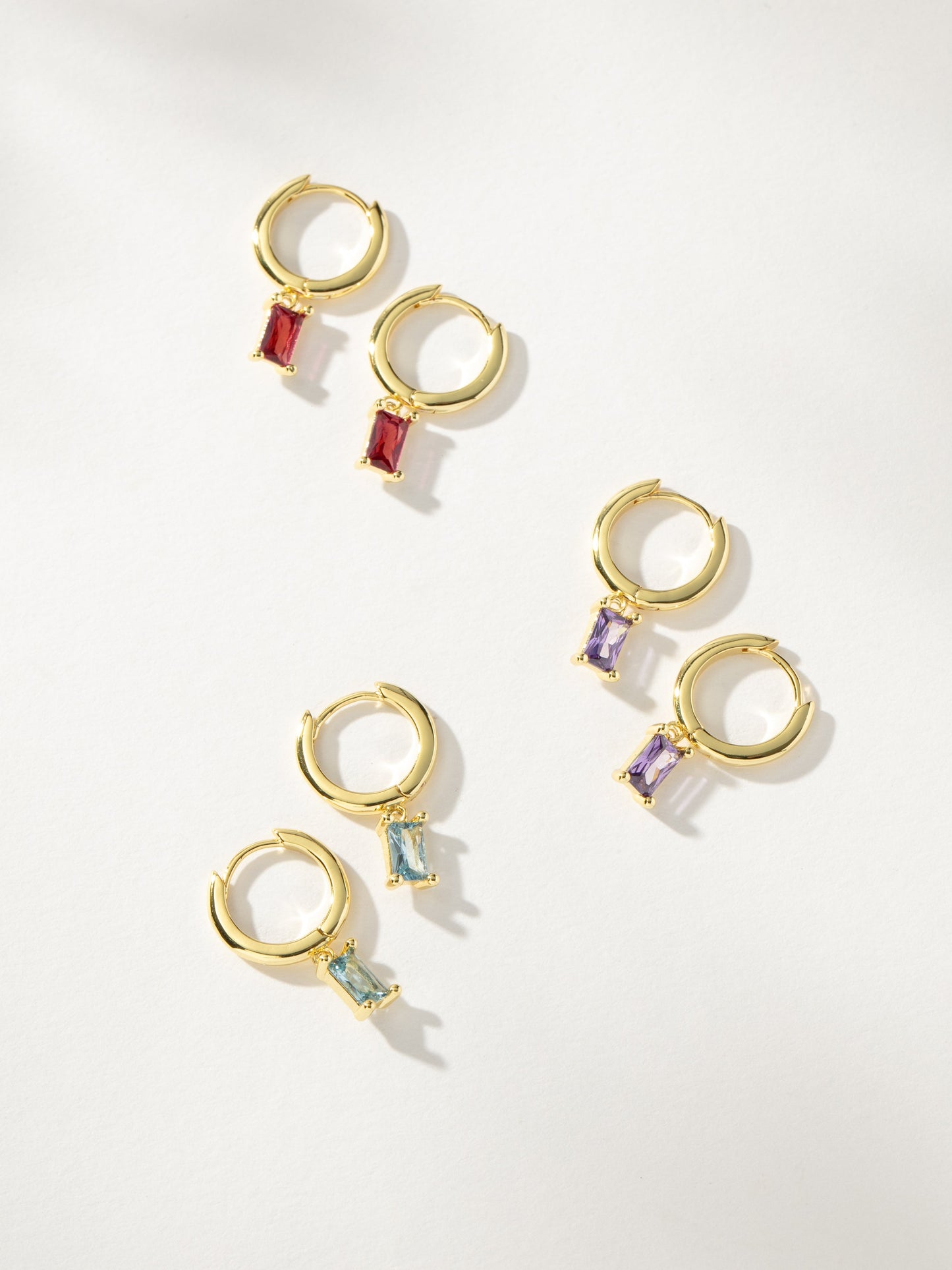 Birthstone Huggie Earrings | Gold | Group Image | Uncommon James