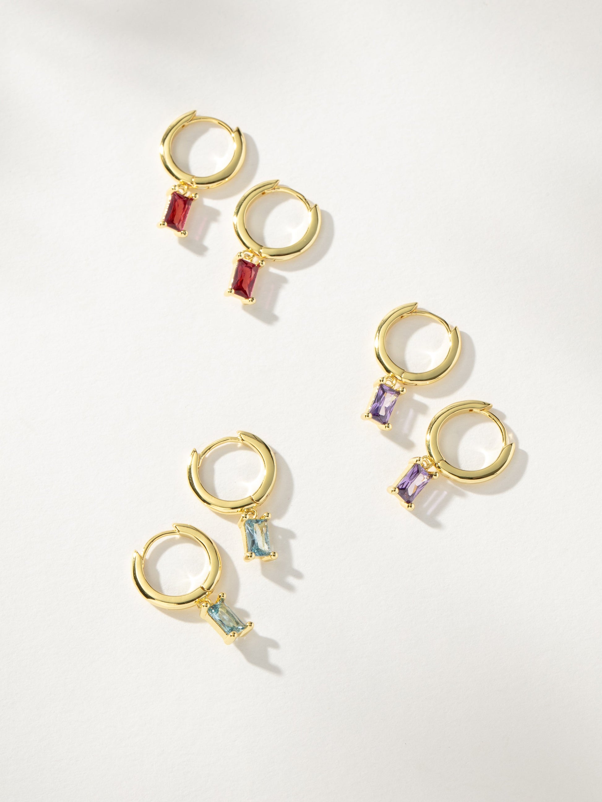 Birthstone Huggie Earrings | Gold | Group Image | Uncommon James