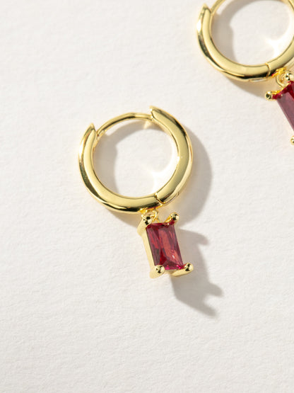 ["Birthstone Huggie Earrings ", " Gold January ", " Product Detail Image ", " Uncommon James"]