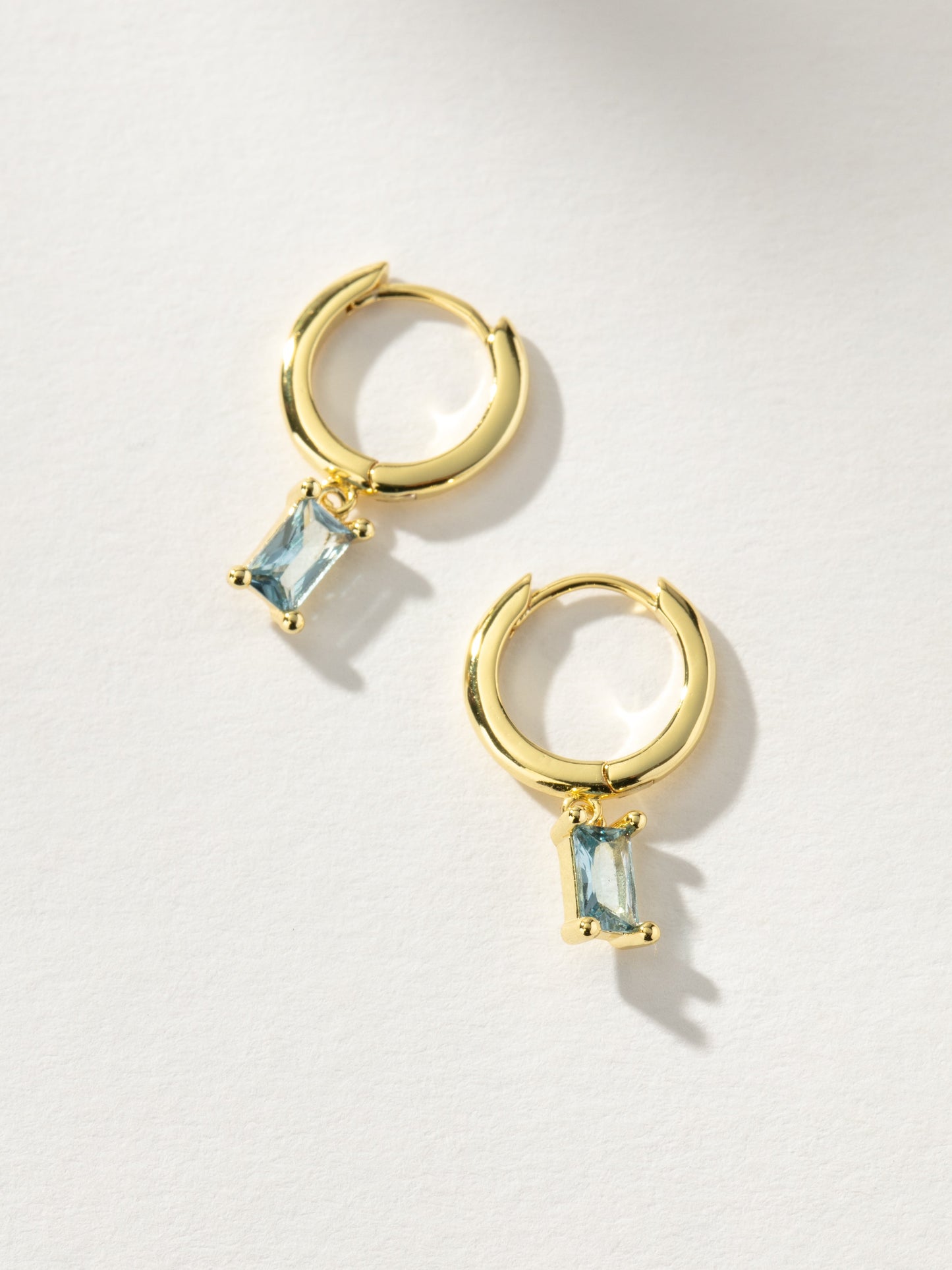 Birthstone Huggie Earrings | Gold March | Product Image | Uncommon James