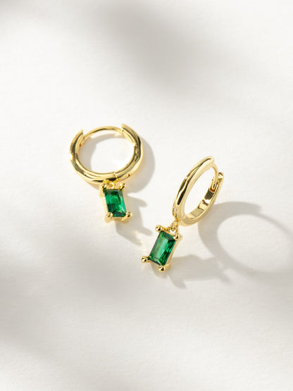 ["Birthstone Huggie Earrings ", " Gold May ", " Product Image ", " Uncommon James"]