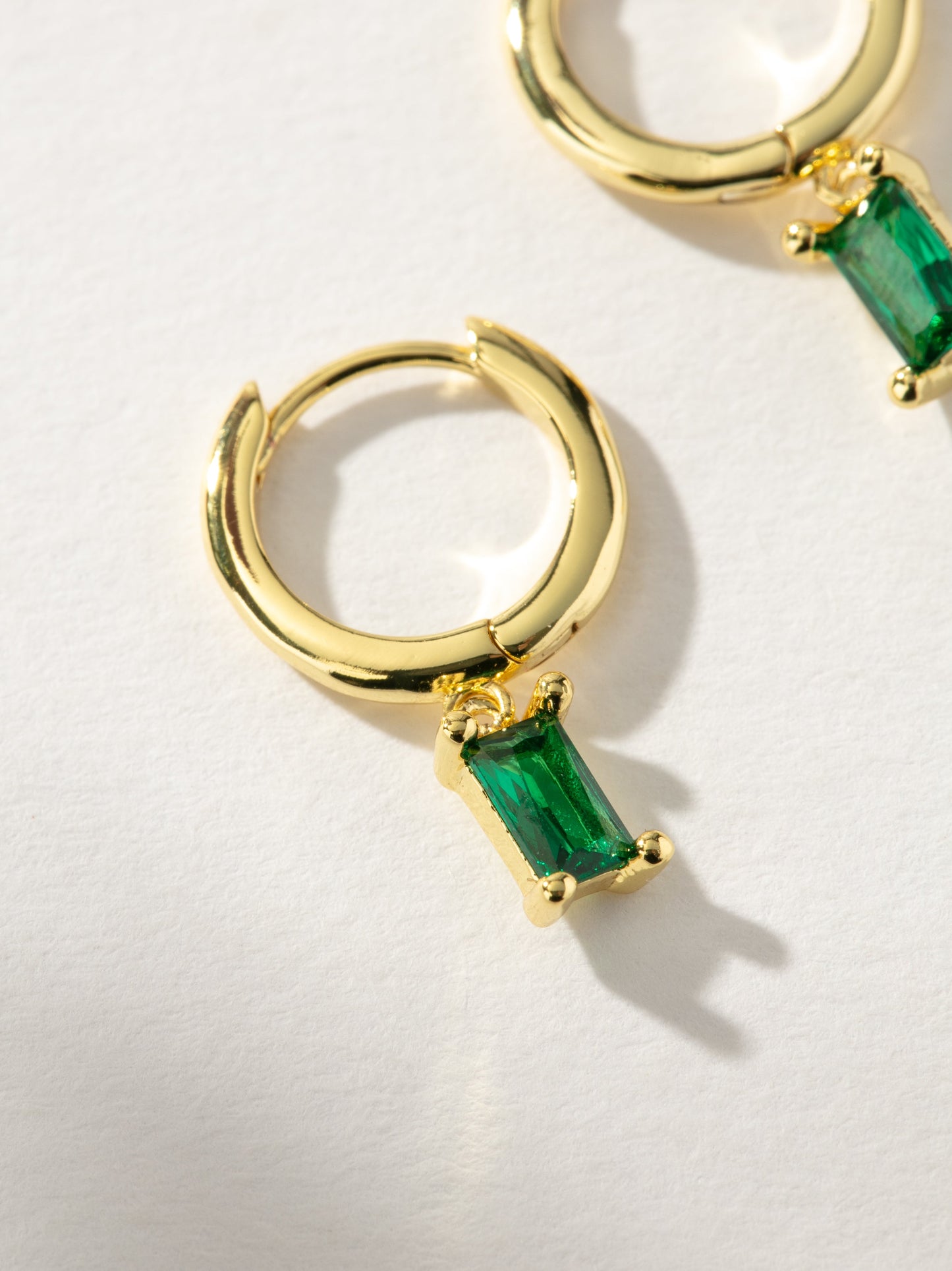 Birthstone Huggie Earrings| Gold May | Product Detail Image | Uncommon James