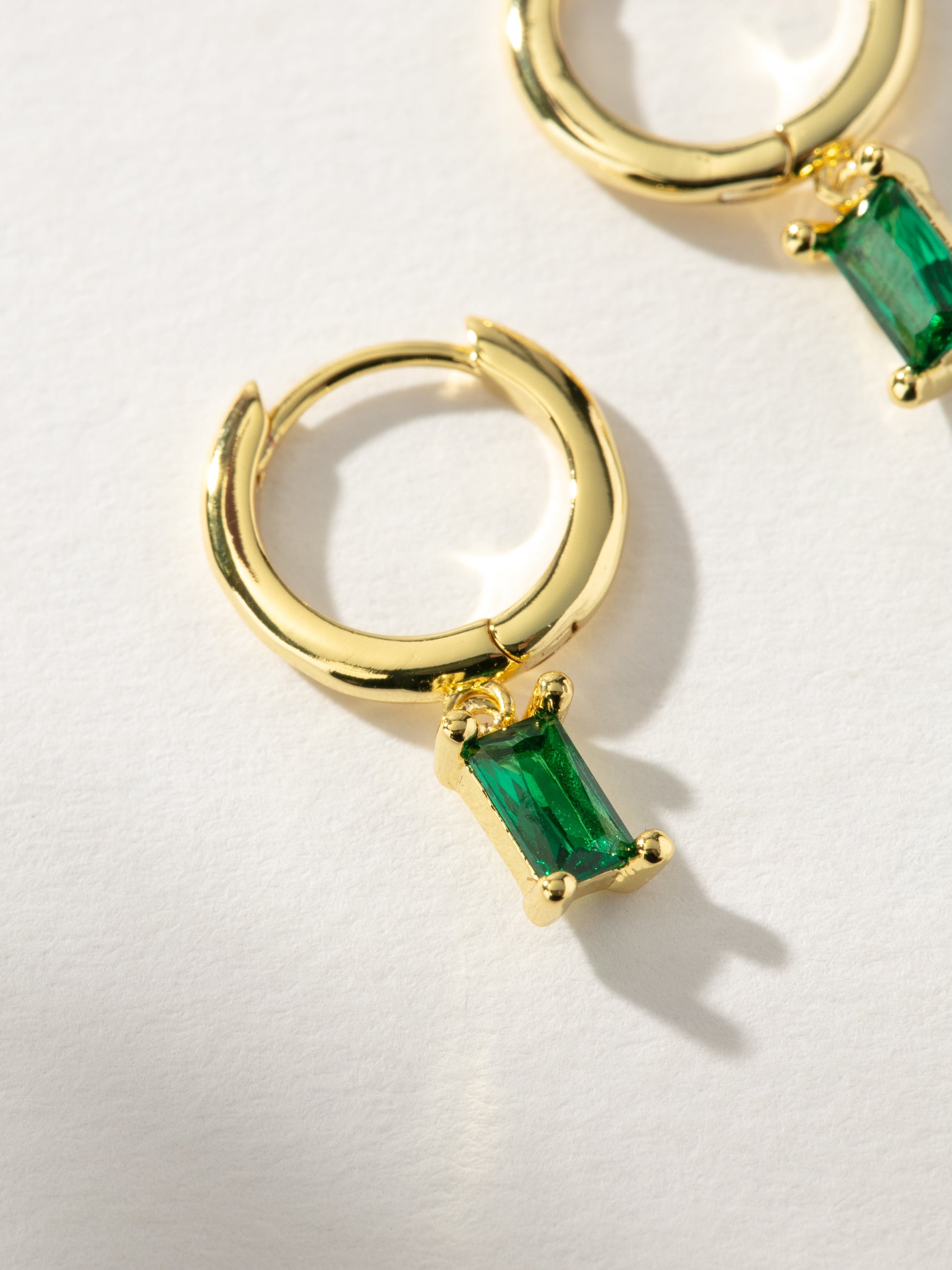 Birthstone Huggie Earrings| Gold May | Product Detail Image | Uncommon James