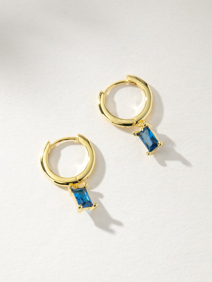 ["Birthstone Huggie Earrings ", " Gold September ", " Product Image ", " Uncommon James"]