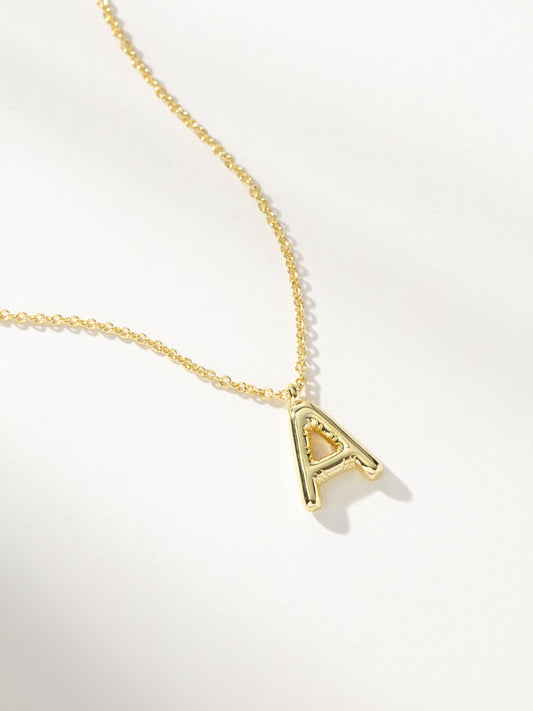 Bubble Letter Necklace | Gold | Group Image | Uncommon James