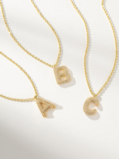["Bubble Letter Necklace 2.0 ", " Gold ", " Group Image ", " Uncommon James"]