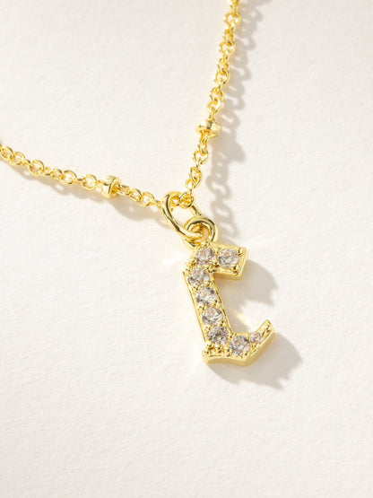 ["Made to Shine Initial Necklace ", " Gold ", " Product Image ", " Uncommon James"]