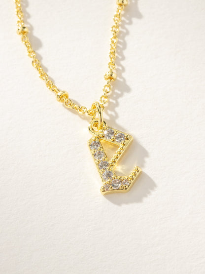 ["Made to Shine Initial Necklace ", " Gold ", " Product Image ", " Uncommon James"]
