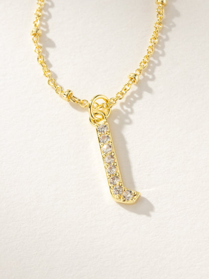 ["Made to Shine Initial Necklace ", " Gold ", " Product Image ", " Uncommon James"]
