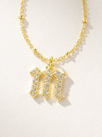 ["Made to Shine Initial Necklace ", " Gold ", " Product Image ", " Uncommon James"]