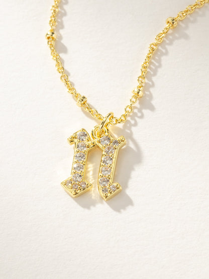 ["Made to Shine Initial Necklace ", " Gold N ", " Product Image ", " Uncommon James"]