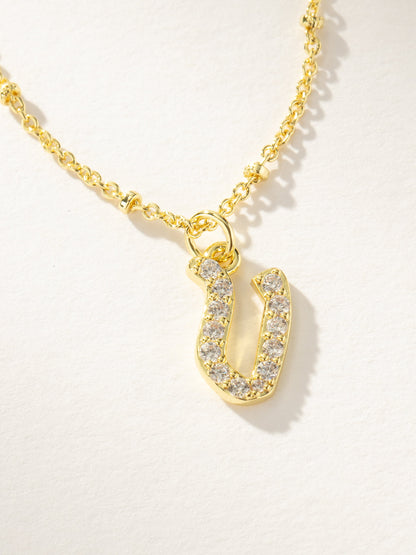 ["Made to Shine Initial Necklace ", " Gold V ", " Product Image ", " Uncommon James"]