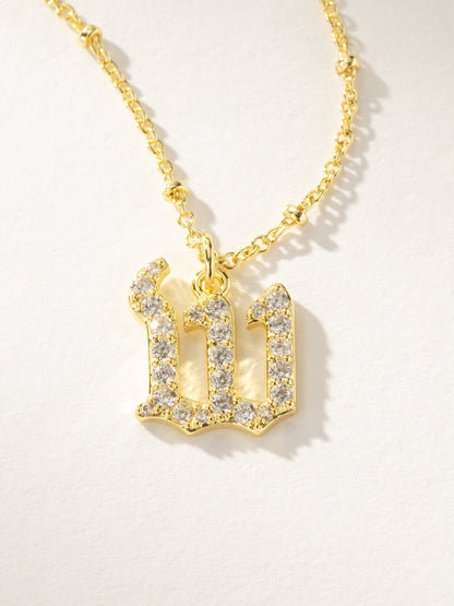 ["Made to Shine Initial Necklace ", " Gold W ", " Product Image ", " Uncommon James"]