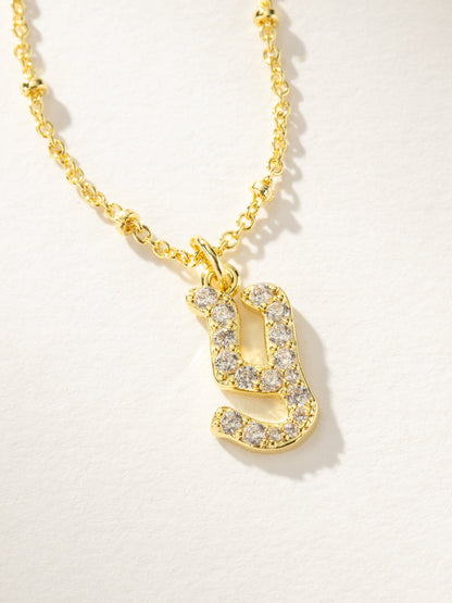 ["Made to Shine Initial Necklace ", " Gold ", " Product Image ", " Uncommon James"]