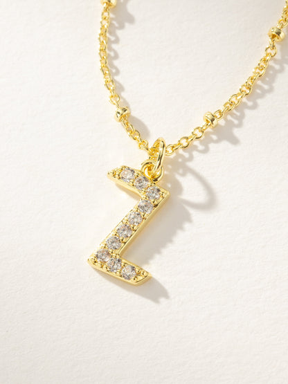 ["Made to Shine Initial Necklace ", " Gold ", " Product Image ", " Uncommon James"]