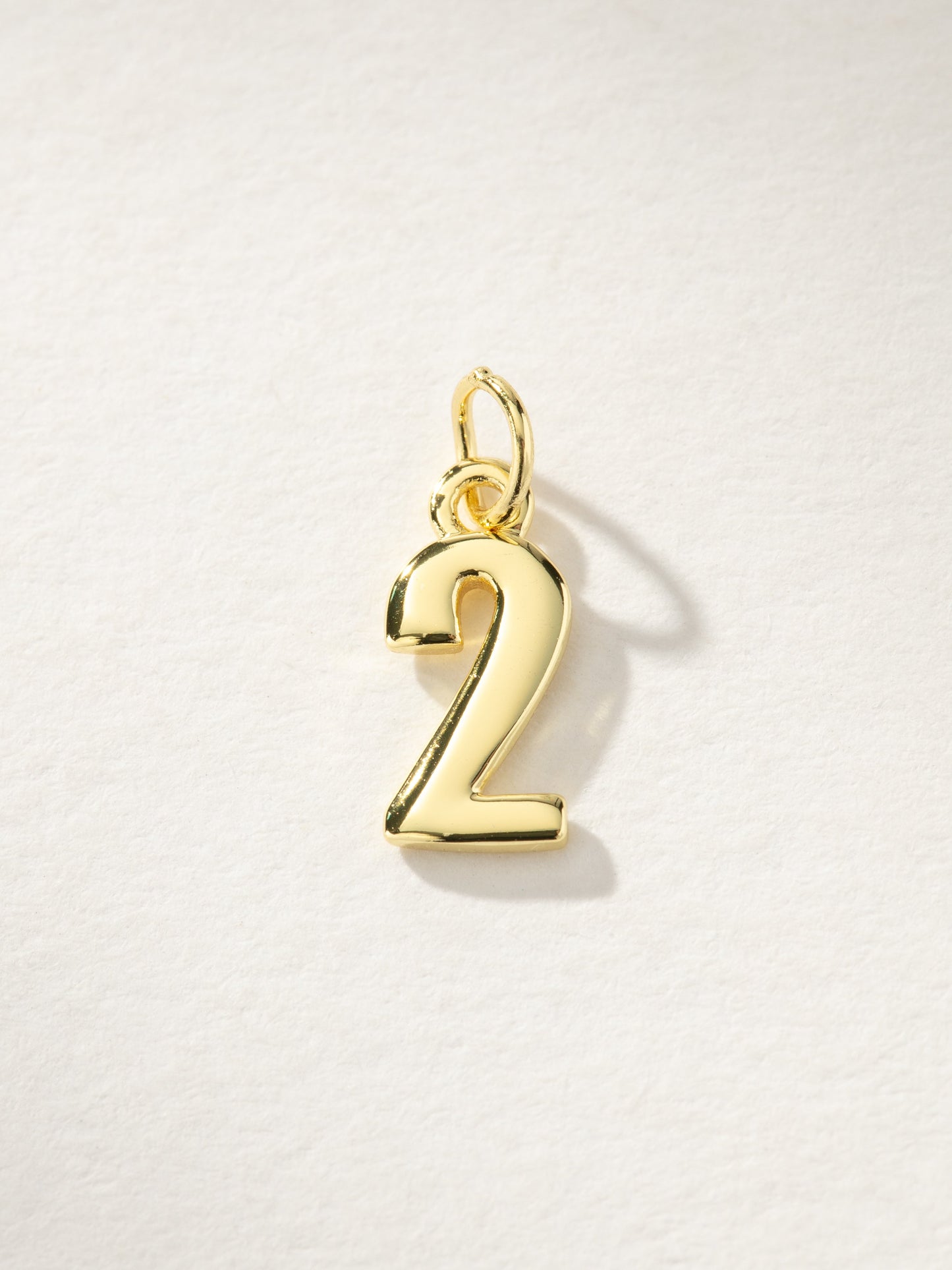 Star Player Charm | Gold 2 | Product Image | Uncommon James