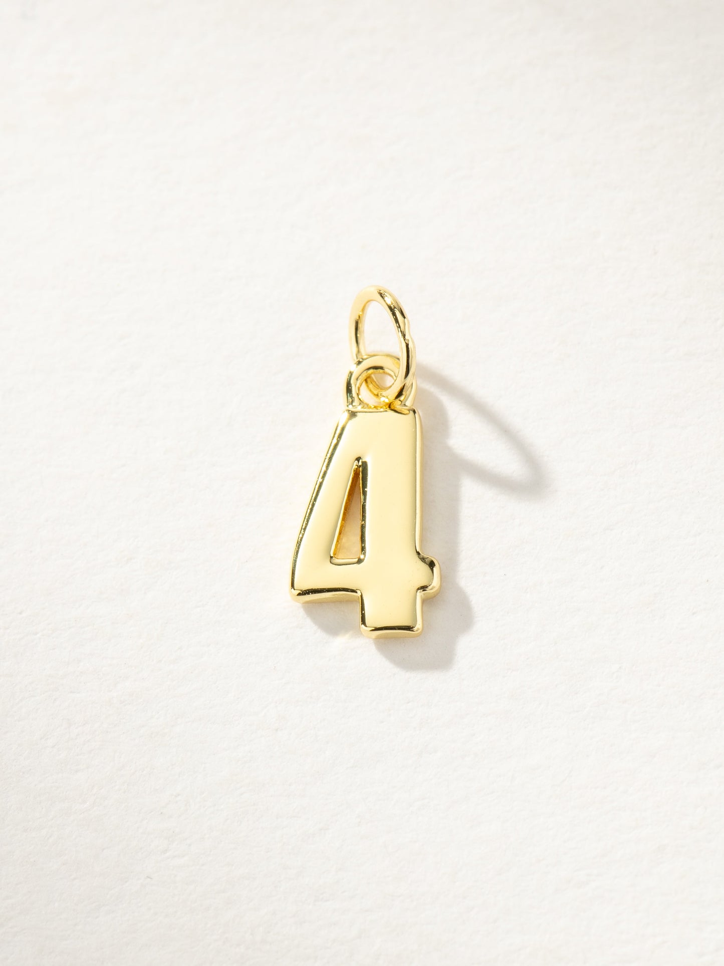Star Player Charm | Gold 4 | Product Image | Uncommon James