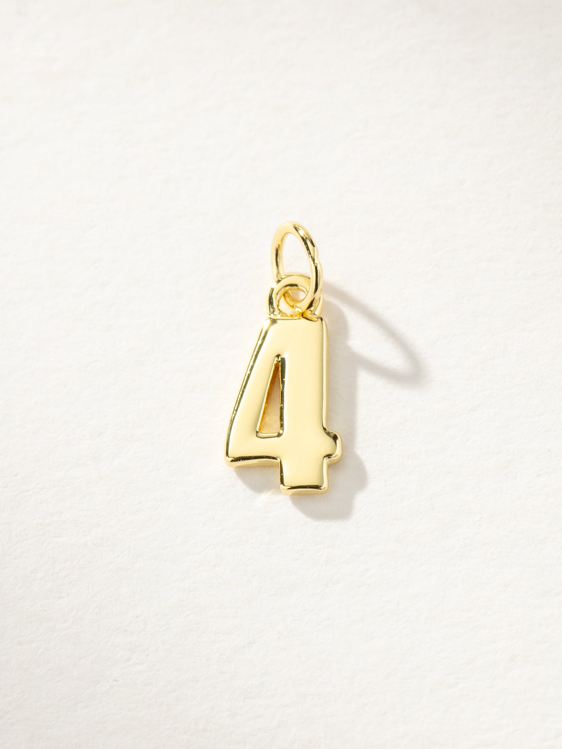 Star Player Charm | Gold 4 | Product Image | Uncommon James
