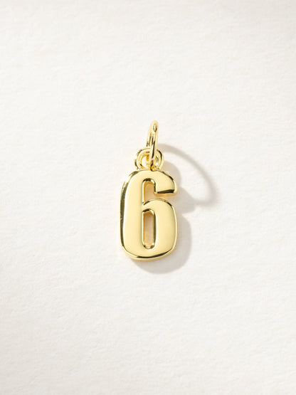 ["Star Player Charm ", " Gold 6 ", " Product Image ", " Uncommon James"]