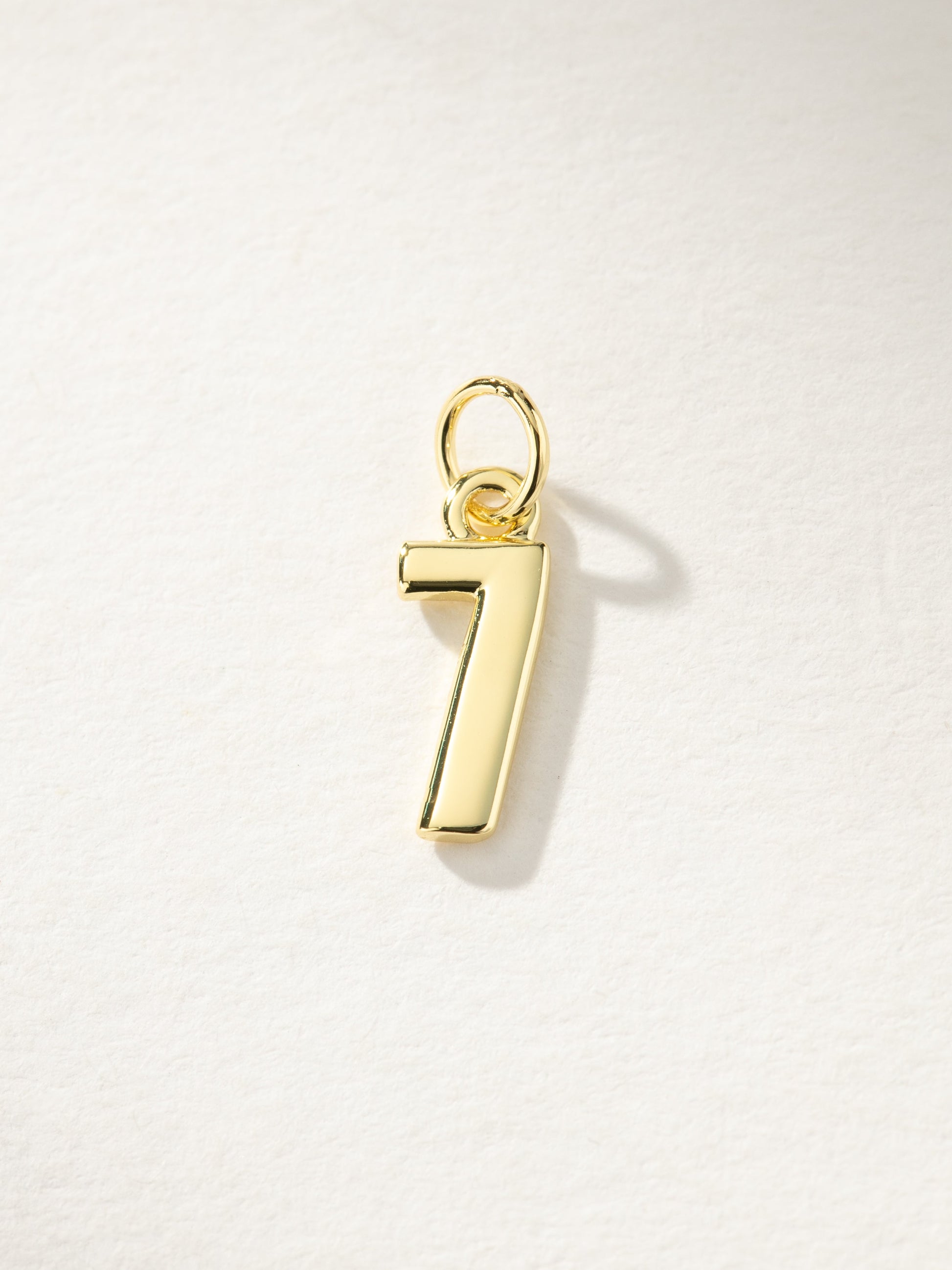 Star Player Charm | Gold 7 | Product Image | Uncommon James