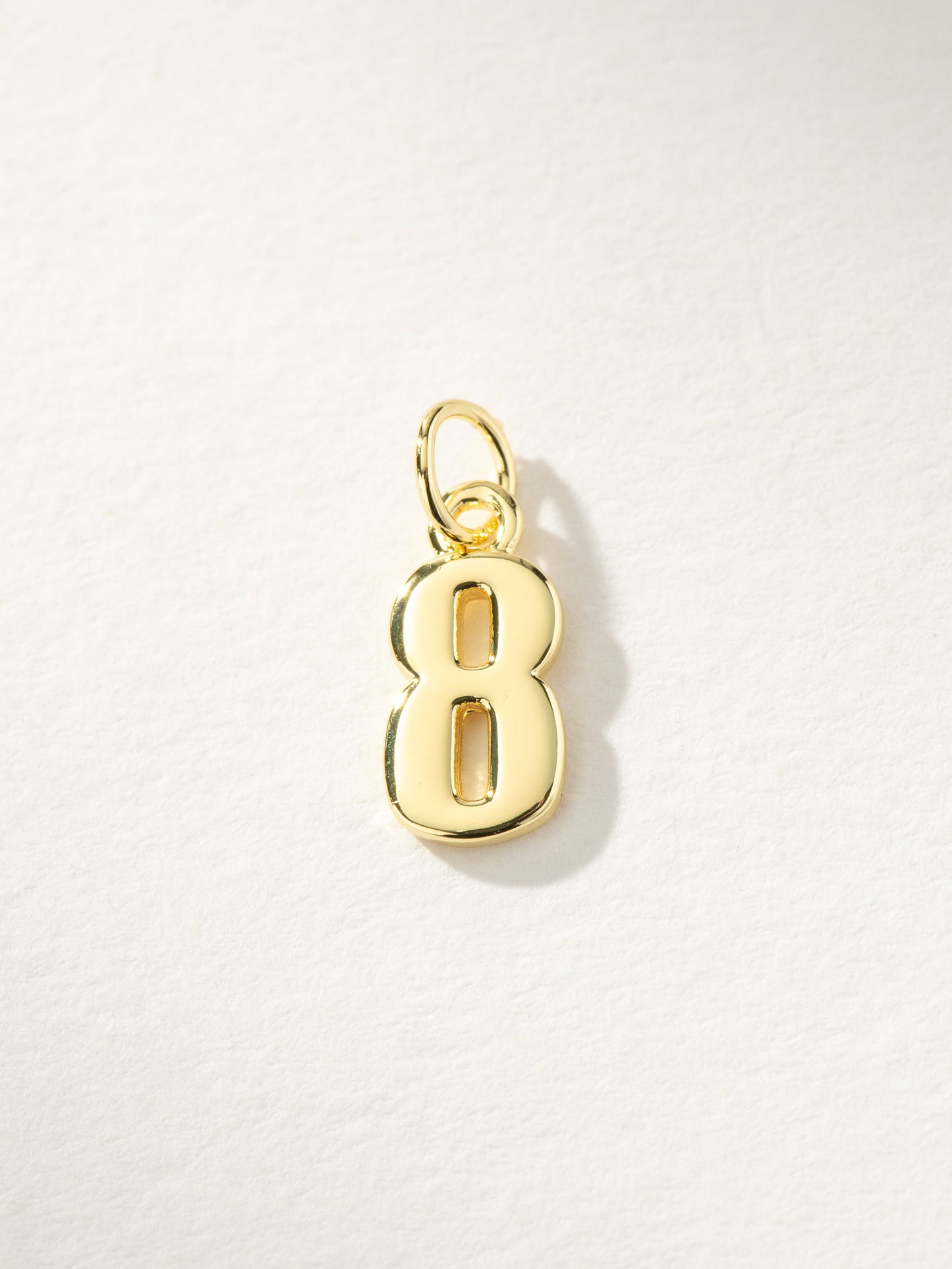 Star Player Charm | Gold 8 | Product Image | Uncommon James