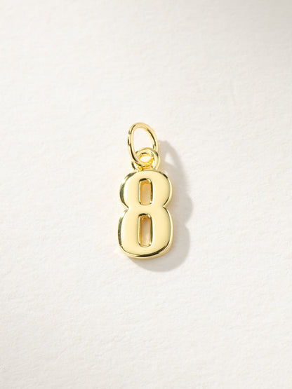 ["Star Player Charm ", " Gold 8 ", " Product Image ", " Uncommon James"]