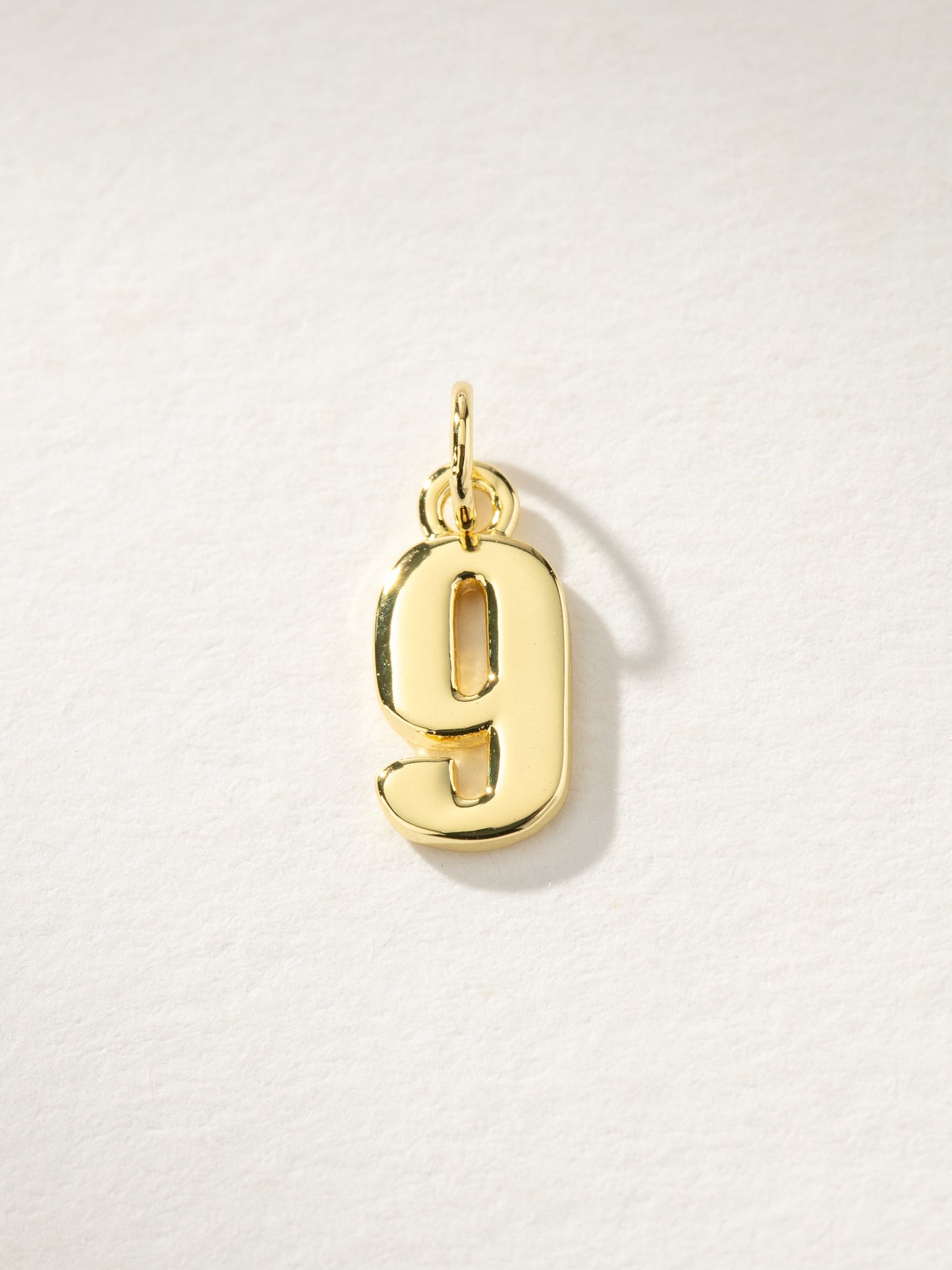 Star Player Charm | Gold 9 | Product Image | Uncommon James
