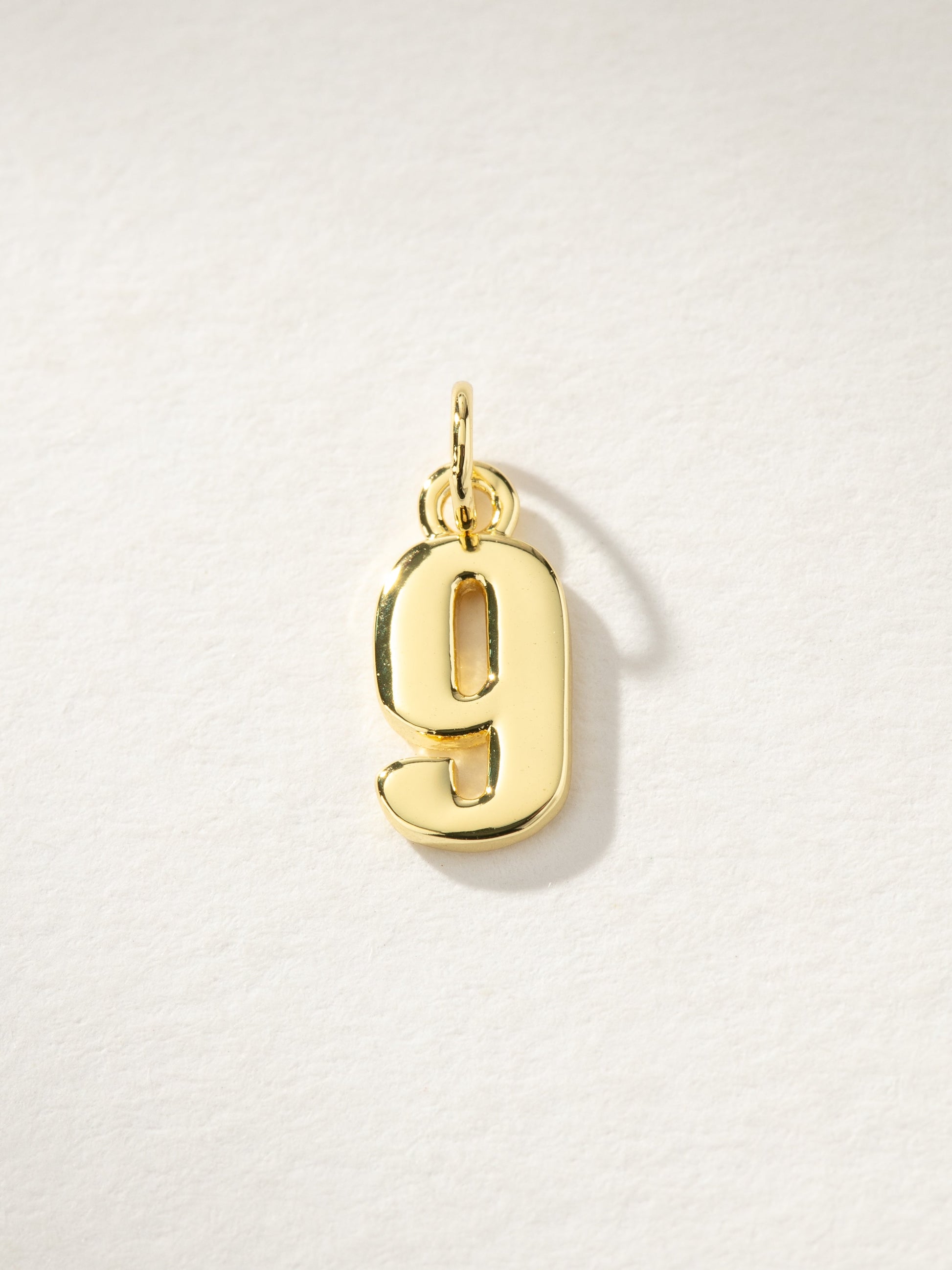 Star Player Charm | Gold 9 | Product Image | Uncommon James