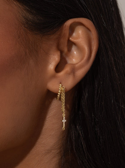 ["Cross and Chain Huggie Earrings ", " Gold ", " Model Image ", " Uncommon James"]