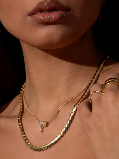 ["Coil Snake Chain Necklace ", " Gold ", " Campaign Image ", " Uncommon James"]