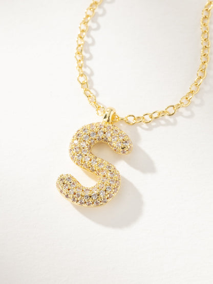 ["Bubble Letter Necklace 2.0 ", " Gold S ", " Product Image ", " Uncommon James"]