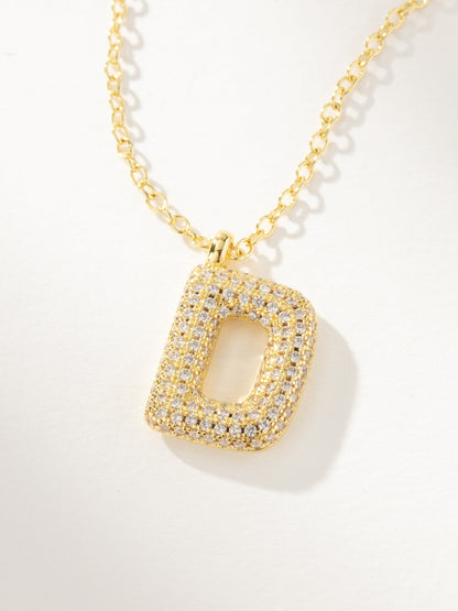 ["Bubble Letter Necklace 2.0 ", " Gold D ", " Product Image ", " Uncommon James"]