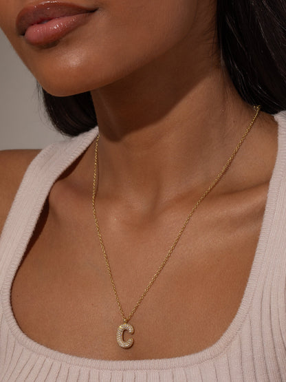 ["Bubble Letter Necklace 2.0 ", " Gold ", " Group Image ", " Uncommon James"]