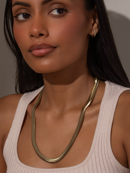 ["Emboldened Snake Chain Necklace ", " Gold ", " Model Image ", " Uncommon James"]