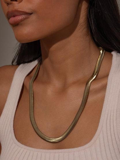["Emboldened Snake Chain Necklace ", " Gold ", " Model Image ", " Uncommon James"]