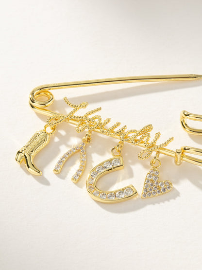 ["UJ x Rustler Howdy Pin ", " Gold ", " Product Image ", " Uncommon James"]
