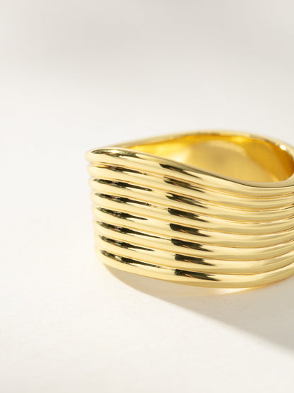 ["Royalty Statement Ring ", " Gold ", " Product Image ", " Uncommon James"]