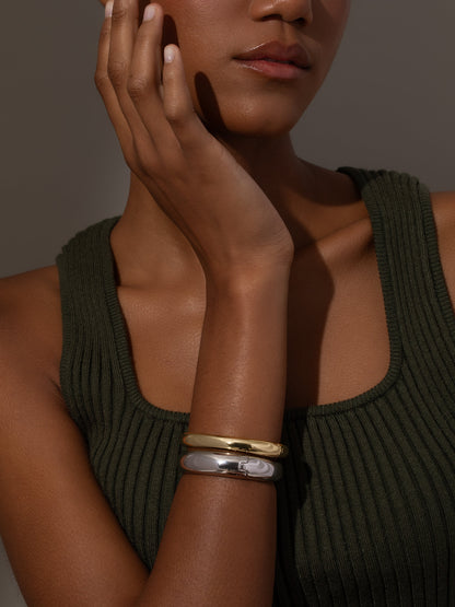 ["Mixed Metal Bangle Bracelet (Set of 2) ", " Mixed Metal ", " Model Image ", " Uncommon James"]