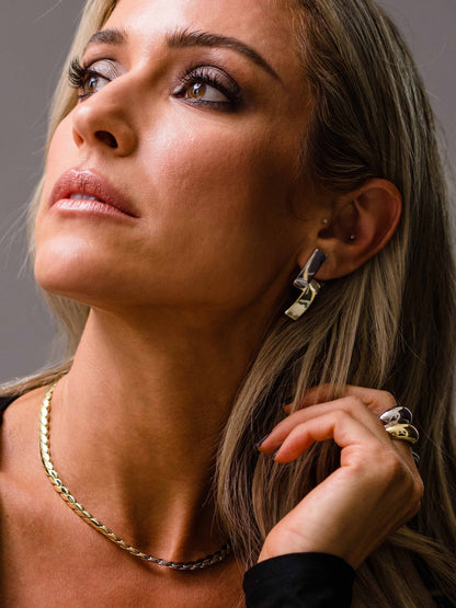 ["Mixed Metal Another Level Earrings ", " Mixed Metal ", " Campaign Image ", " Uncommon James"]
