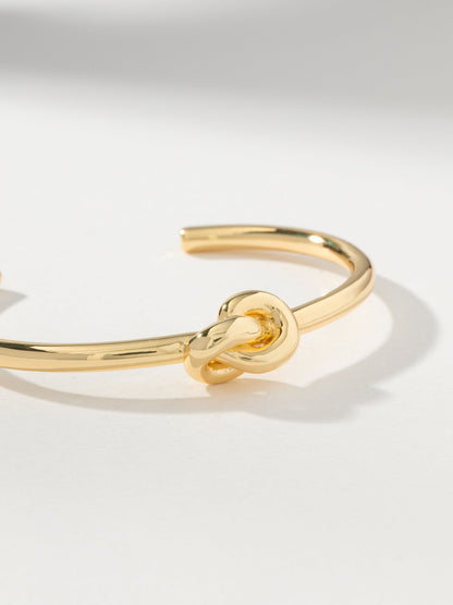 ["Forever Knot Cuff Bracelet ", " Gold ", " Product Image ", " Uncommon James"]