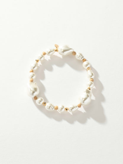 ["Oceanic Pearl Bracelet ", " Gold ", " Product Image ", " Uncommon James"]