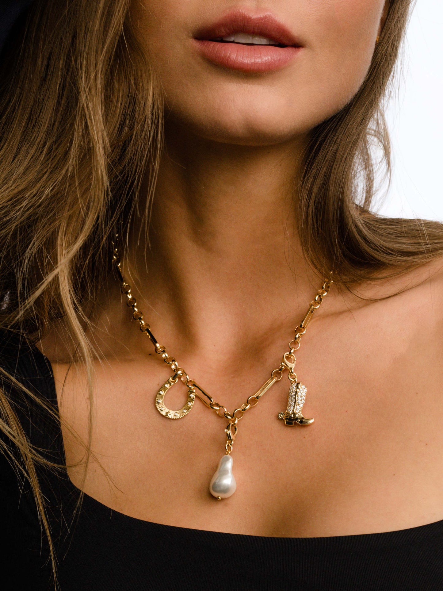 Horseshoe Charm | Gold | Model Image | Uncommon James
