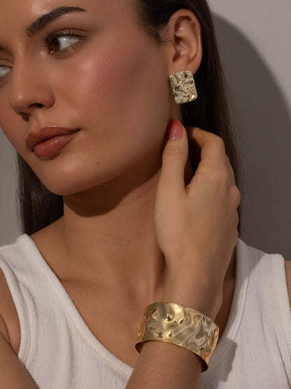 ["Crushed Statement Stud Earrings ", " Gold ", " Campaign Image ", " Uncommon James"]