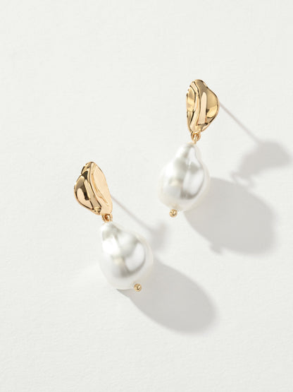 ["Sole Pearl Drop Statement Earrings"]