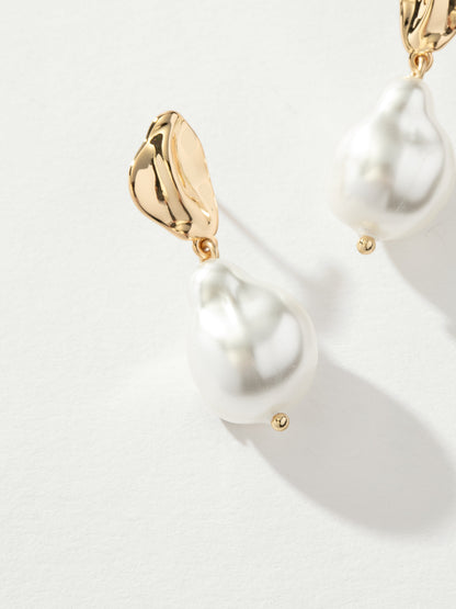 ["Sole Pearl Drop Statement Earrings"]