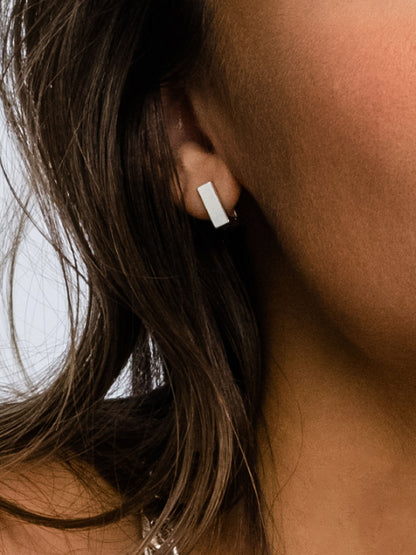 ["Passion Square Huggie Earrings ", " Silver ", " Model Image ", " Uncommon James"]