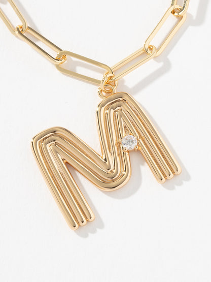 ["Muse Initial Layered Necklace ", " Gold M ", " Product Image ", " Uncommon James"]